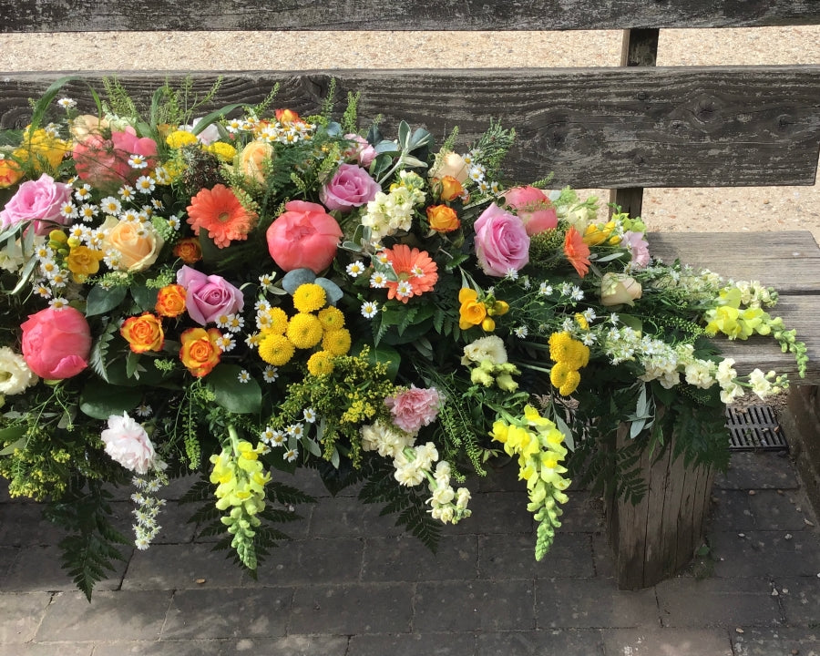 Apricot & Yellow Casket Spray fresh flowers made by The Petal Boutique in Winchester