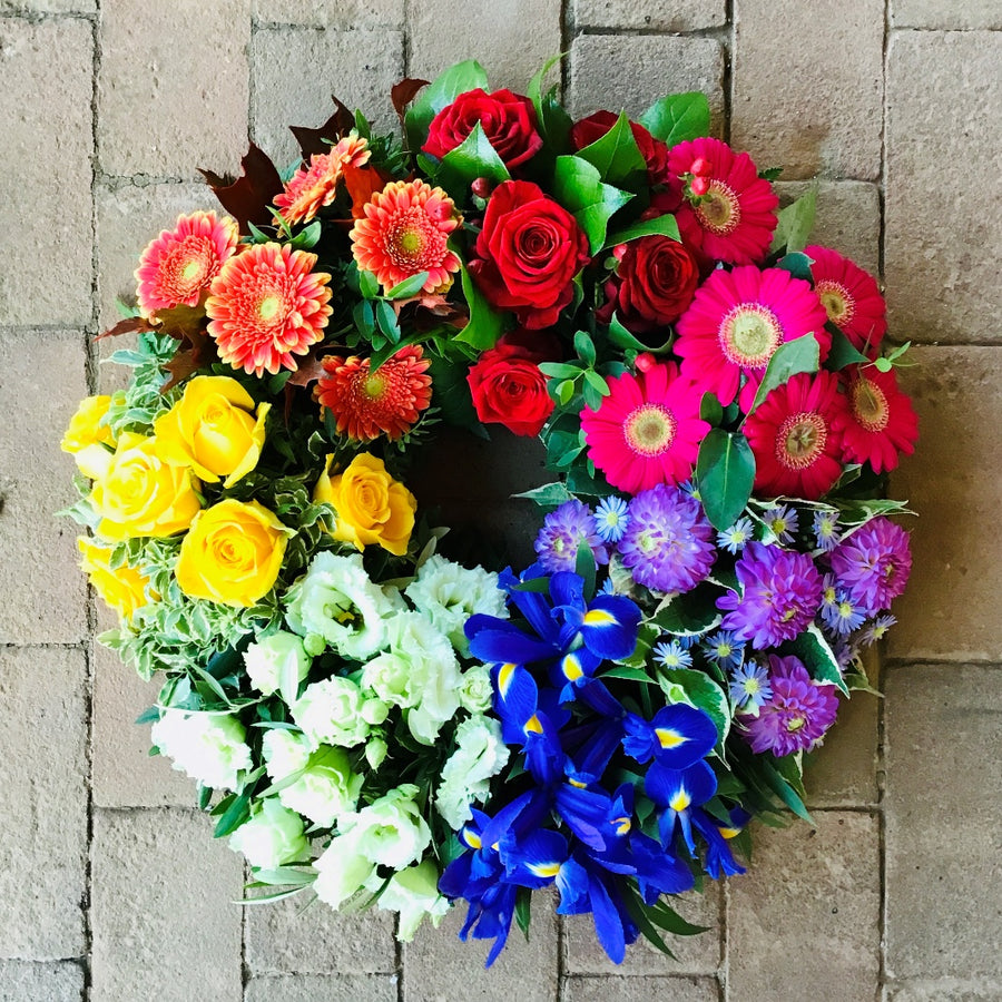Rainbow Funeral Wreath fresh flowers made by The Petal Boutique in Winchester